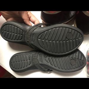 Crocs black flip flops